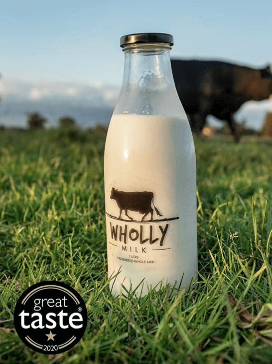 Wholly-Milk-Bottle-in-Field